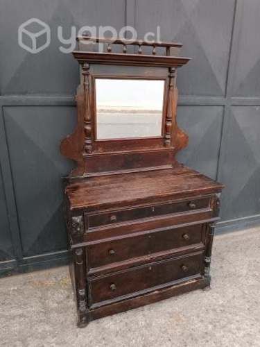 Mueble antiguo con espejo y cajones
