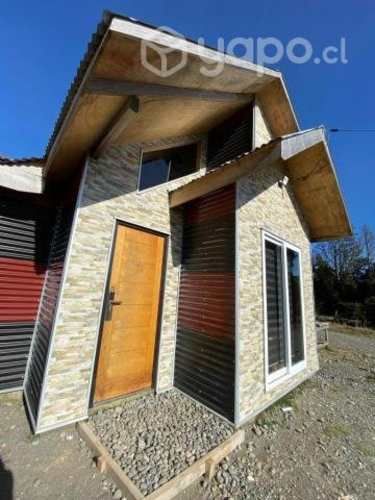 Parcela con casa recién construida