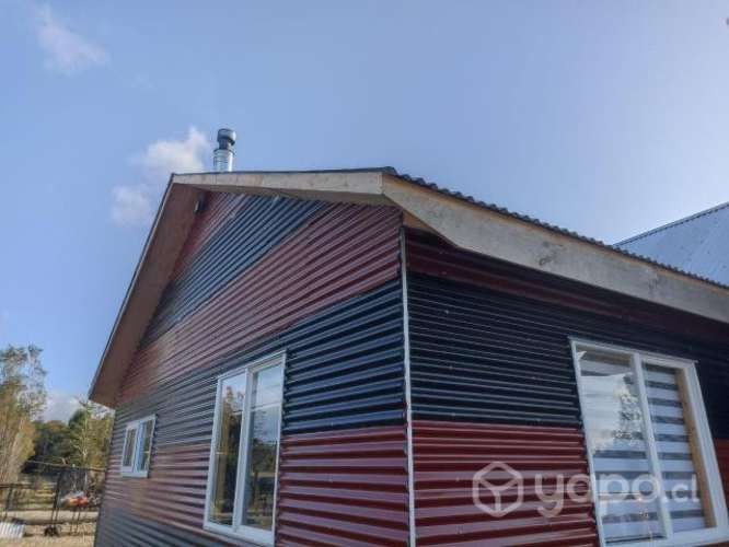 Parcela con casa recién construida