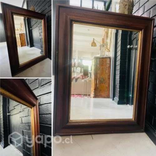 Espejo biselado con marco de madera café y dorado