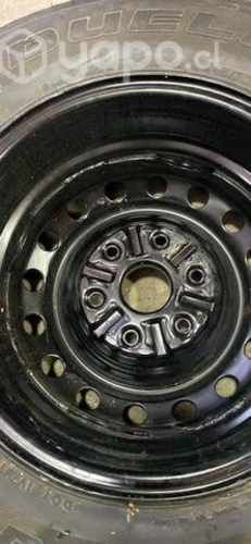 Neumático y llanta camioneta Mitsubishi L200