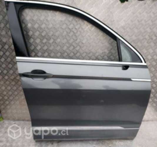 Puerta de volkswagen Tijuan y focos de hyundai