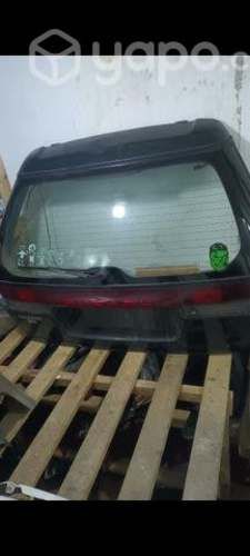 Portalon con embellecedor Subaru legacy 1995-1999