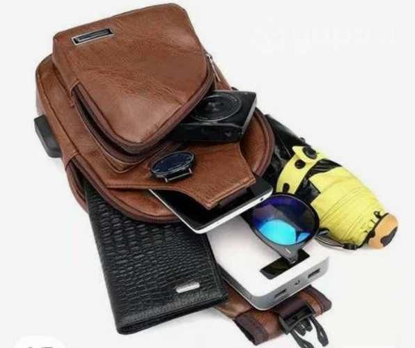 Billeteras de cuero ,mochila cruzada espaciosa yel