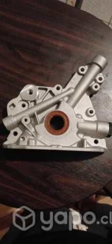 Bomba de aceite y cámara retroceso