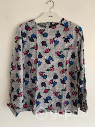 Blusa talla M, metros Tobalaba y Colón