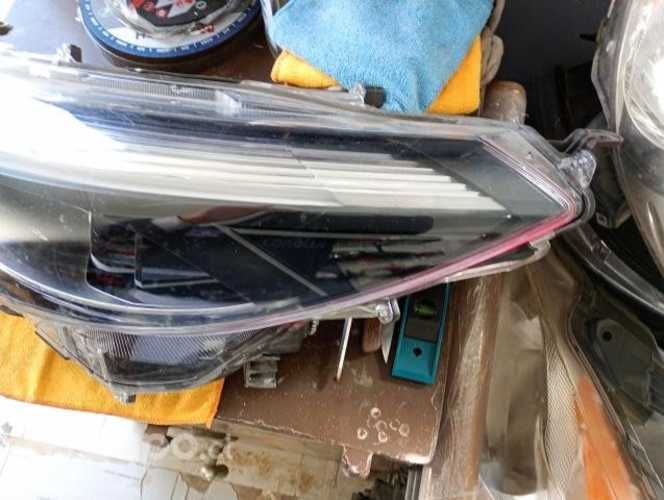 Optico izquierdo Toyota Corolla Cross gris ORIGINA