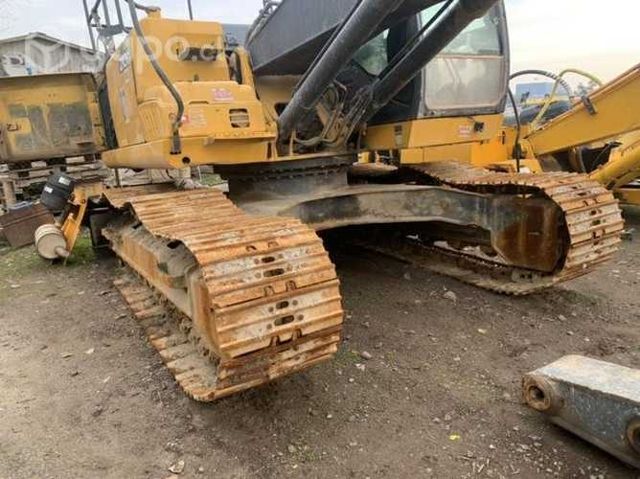 Jhon Deere 210G, juego Cadenas buen estado