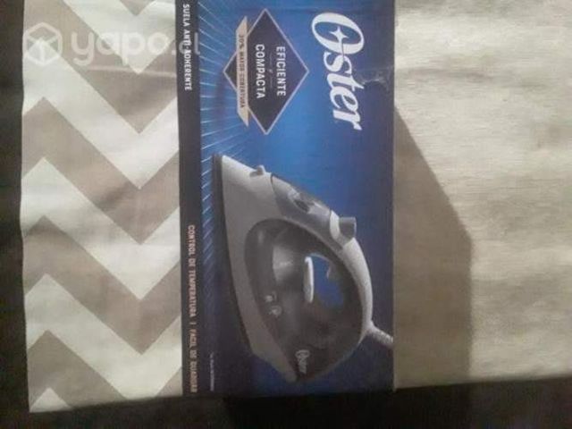 Plancha NUEVA marca Oster