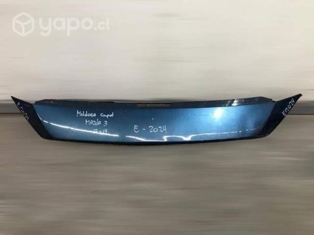 Moldura capot mazda 