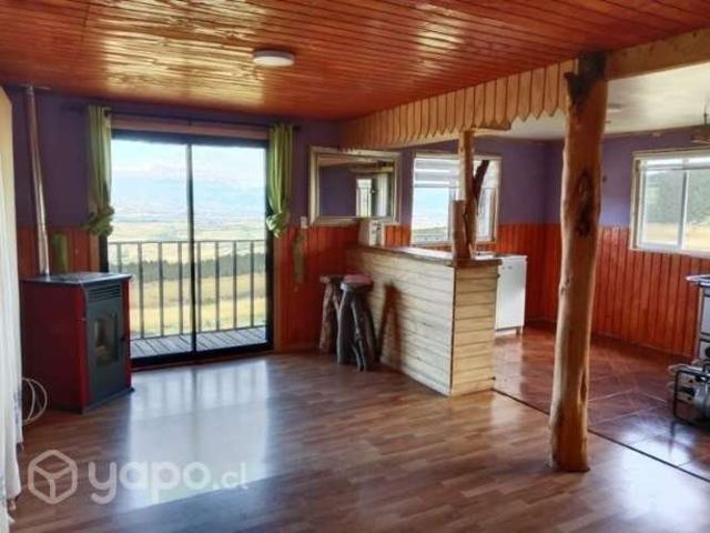 Vendo parcela con casa