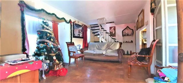 CASA Estación de Metro Los Quillayes / Villa Los Ruiseñores