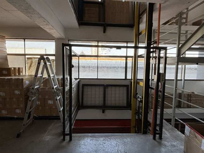 BODEGA Américo Vespucio / Santa Clara