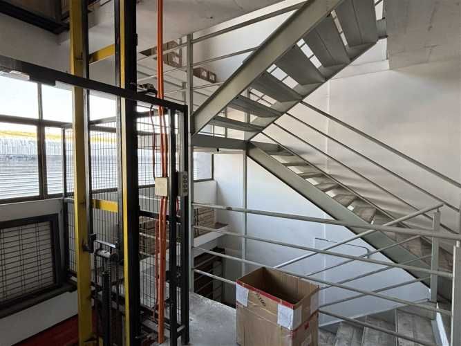 BODEGA Américo Vespucio / Santa Clara