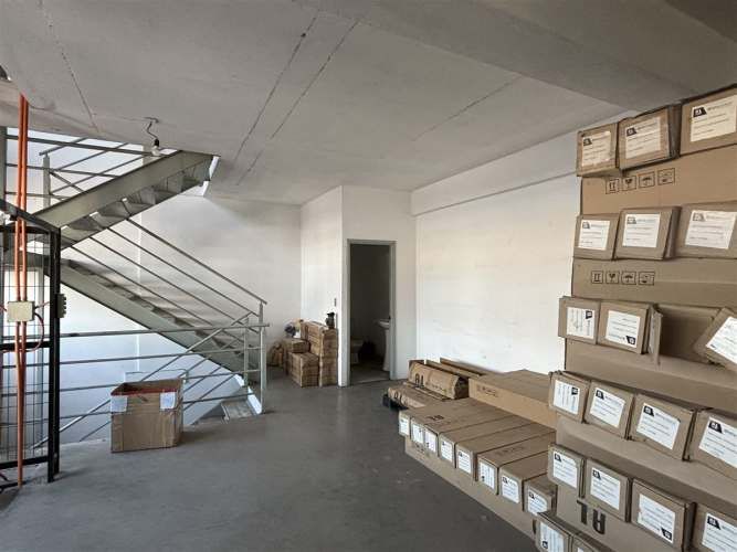 BODEGA Américo Vespucio / Santa Clara