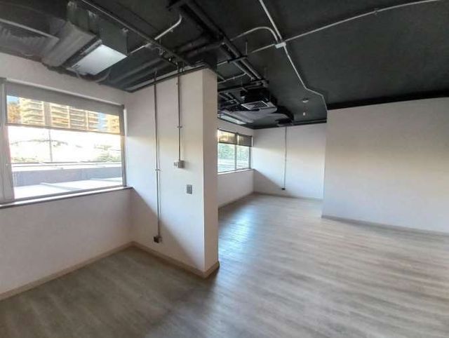 OFICINA Tobalaba / Cristóbal Colón