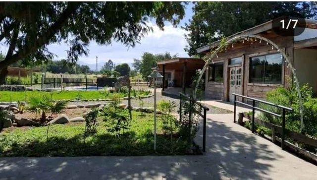 PARCELA A METROS DEL PUENTE TRES ARCOS