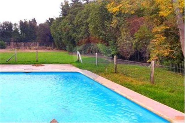 Parcela 5.187m2 con casa 130m2 4d/2b