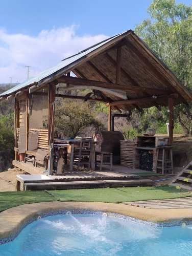 Por viaje vendo parcela Con Casa Amoblada, Piscina, 3d 2b Regularizada