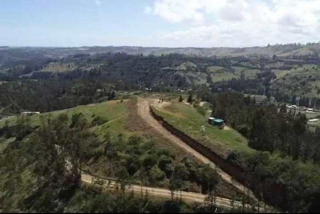 Gran terreno en condominio Pupuya (67281)