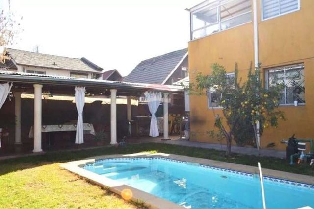 Dos casas en un terreno de 452 m2 en ñuñoa