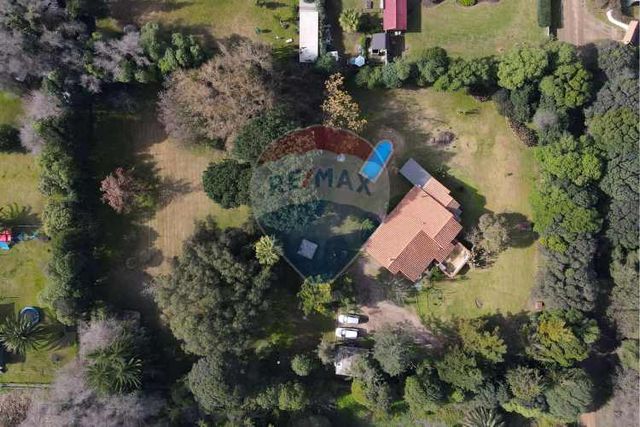 Parcela en venta, con jardín de ensueño