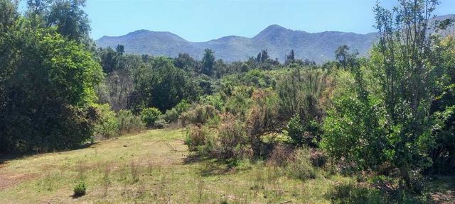 PARCELA Los Claveles con Las palmas