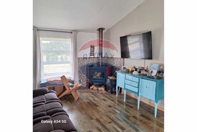 Venta parcela con casa