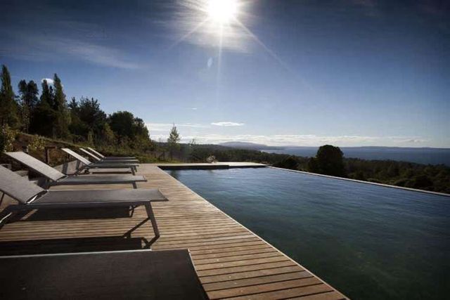 PARCELA INVERSIONISTAS! Lodge funcionando a 5 min del centro de Pucón.