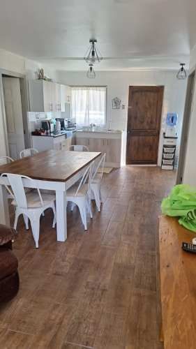 AMPLIO TERRENO CON ACOJEDORA CABAÑA Y PISCINA