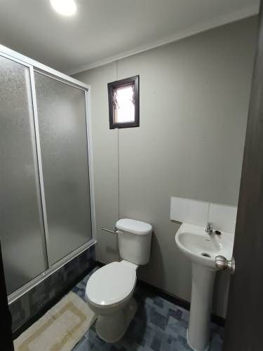 TERRENO CONSTRUCCION TERRENO DE 3298mt2 urbanizado con agua y luz Hermosa vista despejada a la Bahía de la Herradura, con 10 departamentos amoblados para arriendo.