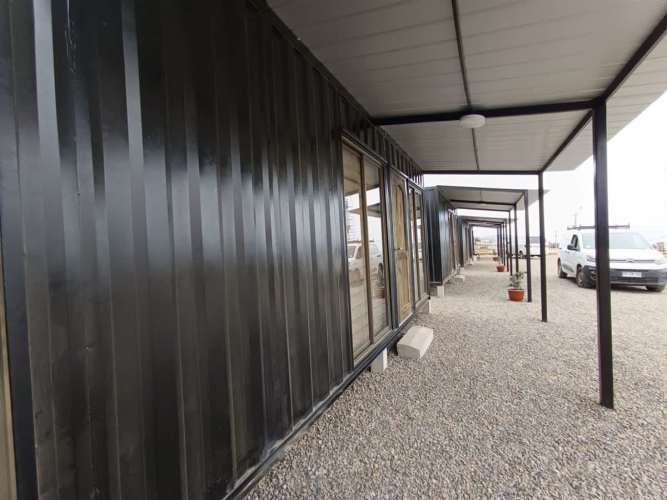 TERRENO CONSTRUCCION TERRENO DE 3298mt2 urbanizado con agua y luz Hermosa vista despejada a la Bahía de la Herradura, con 10 departamentos amoblados para arriendo.