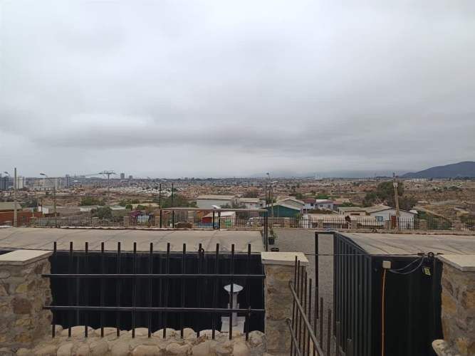 TERRENO CONSTRUCCION TERRENO DE 3298mt2 urbanizado con agua y luz Hermosa vista despejada a la Bahía de la Herradura, con 10 departamentos amoblados para arriendo.