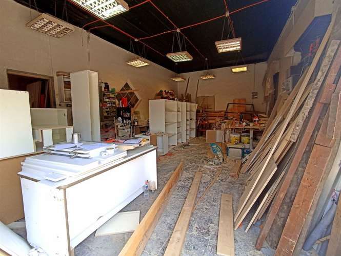 OFICINA Sargento Aldea / Metro Ñuble