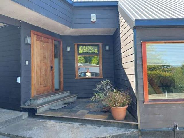 PARCELA Amplia casa con Quincho, Bodega y Cancha de Tenis - Lomas de Reloncaví