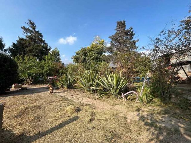 Parcela con casa 4D+2B de uso comercial (94569)