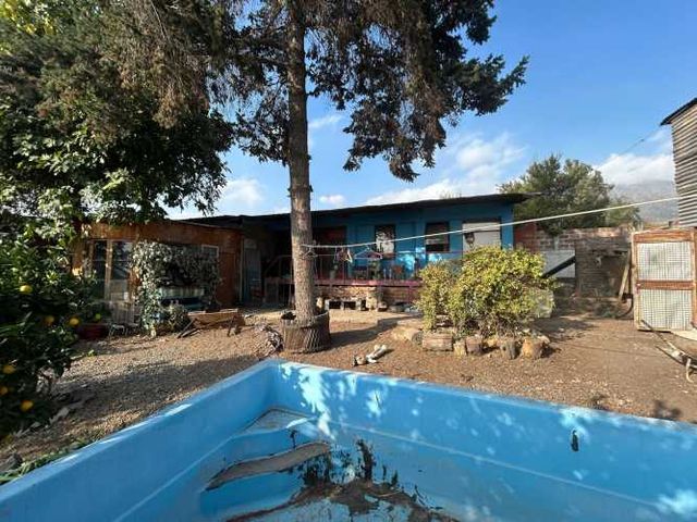 Parcela con casa 4D+2B de uso comercial (94569)