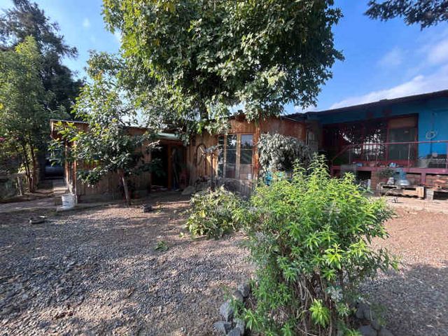 Parcela con casa 4D+2B de uso comercial (94569)