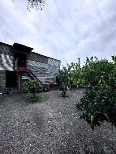 Parcela con casa 4D+2B de uso comercial (94569)