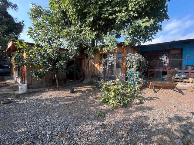 Parcela con casa 4D+2B de uso comercial (94569)