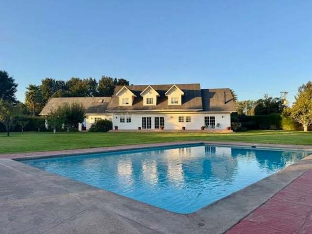 PRECIOSA PARCELA EN TALAGANTE DOS CASAS Y PISCINA