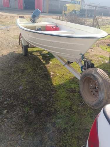 Bote con Motor Yamaha 15HP y accesorios