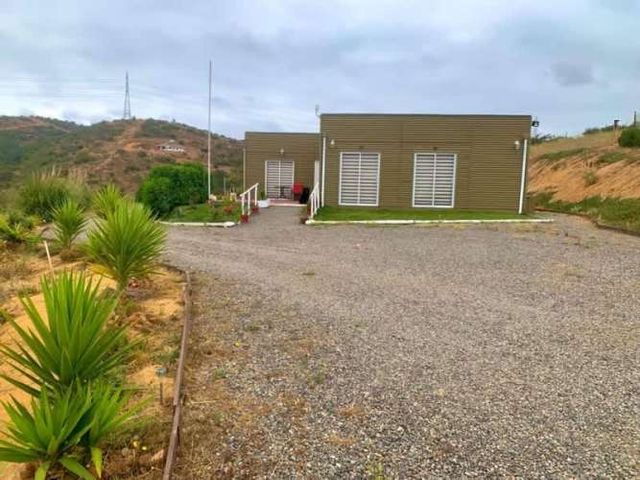 LIMACHE. VENDE CASA EN TERRENO DE 9.000 M2.