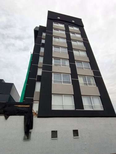 Central, 2 dorm. 2 baños, estacionamiento Bodega