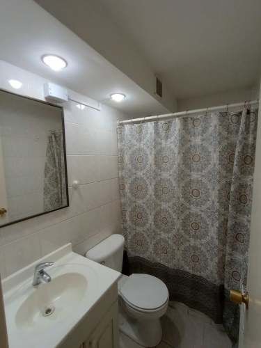 Central, 2 dorm. 2 baños, estacionamiento Bodega