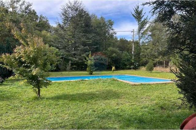 Casa en parcela con 2 cabañas en pucon