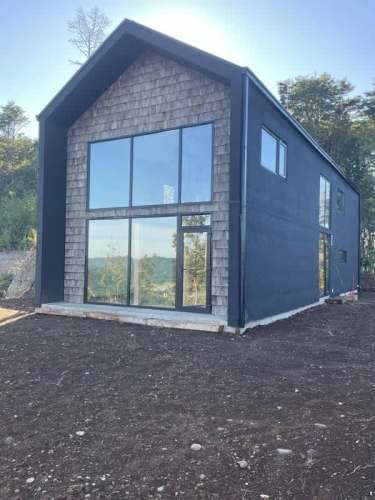 CASA CON ESPECTACULAR VISTA EN CAMINO LAS LOMAS PUERTO VARAS