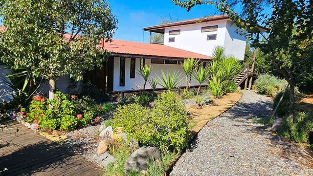 BELLA PARCELA 6000 m2 CON 2 CASAS, HERMOSA VISTA Y JARDINES MELIPILLA SUR