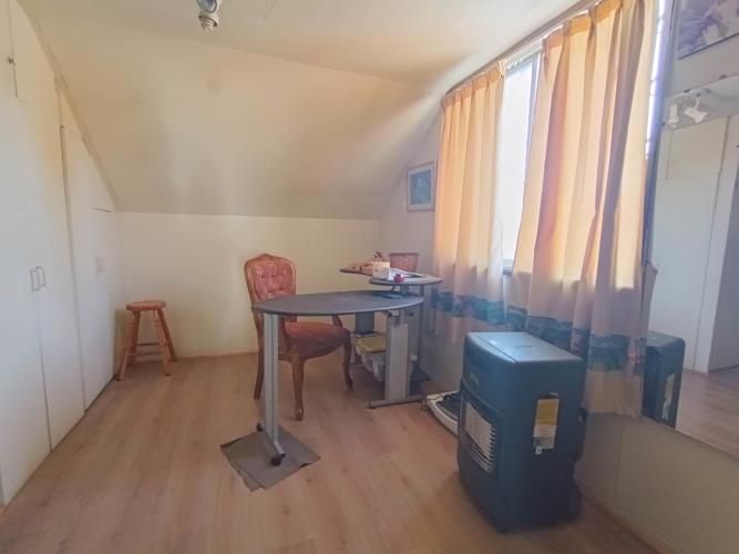 Casa ampliada en barrio tranquilo