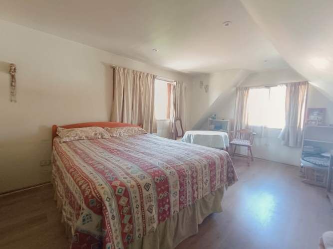 Casa ampliada en barrio tranquilo